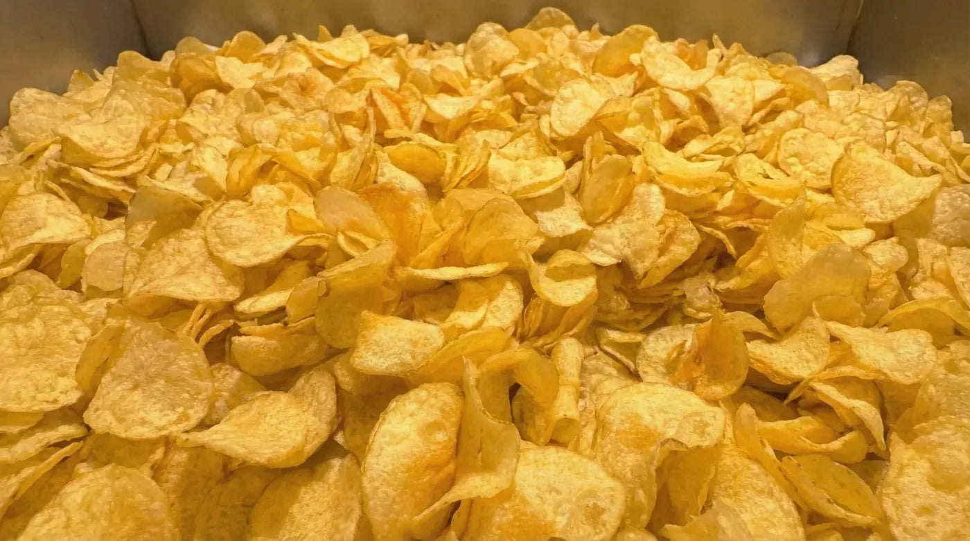 A landscape of golden kettle-cooked potato chips
